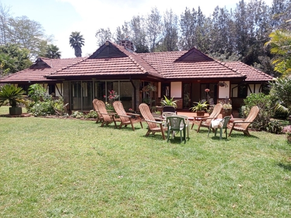 4-Bedroom Bungalow for Sale in Karen Miotoni 📍 Location: Karen Miotoni 💰 Price: KSh 115M 📞 Contact: 0732675057 Set on a spacious 1-acre plot, this charming 4-bedroom bungalow is located in the serene area of Miotoni, Karen. Part of a gated community of just 10 houses, this home offers peace, privacy, and a lush mature garden filled with fruit and indigenous trees. Key Features: - All Rooms En-suite: Each bedroom comes with its own bathroom for ultimate comfort. - Mature Garden: Enjoy the outdoors with a beautifully landscaped garden, featuring fruit and indigenous trees. - Indoor Garden Space: Brings a touch of nature inside the house, creating a relaxing atmosphere. - Ample Natural Lighting: Large windows and smart design allow natural light to flood the space. - Study Area: A quiet and dedicated space for work or reading. - 2 Fireplaces: Cozy up in the living areas with built-in fireplaces. - DSQ for Two: Spacious quarters for domestic staff. - Detached Office/Storage Space: Versatile space for extra storage or a private office. - Carport for Two Cars: Secure parking space for vehicles. - Solar Water Heating: Eco-friendly energy solution. - Inverter: Backup power to keep the home running smoothly. This home is perfect for those looking for a blend of rustic charm and modern living in a quiet, lush environment. #KarenBungalowForSale #LuxuryHomesKenya #KarenRealEstate #NairobiHomes #GatedCommunityKenya #EcoFriendlyLiving #MiotoniKaren