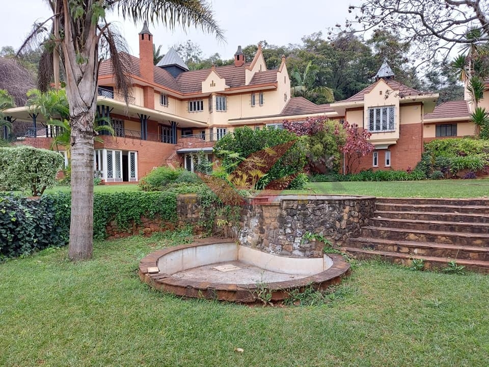 ### Luxurious 6-Bedroom Ambassadorial Mansion for Sale in Old Muthaiga -- Ksh. 400M Discover unparalleled luxury and prestige with this newly built 6-bedroom double-storey mansion located on the exclusive Muthaiga Road. Set on a sprawling 1-acre plot, this stunning residence offers modern sophistication, privacy, and a serene view of Karura Forest. #### Key Features: - 5 Spacious Bedrooms: All ensuite, featuring modern, imported tubs and showers for ultimate comfort. - VIP Lounge: An exclusive space for relaxation and hosting guests. - Indoor Swimming Pool: Swim year-round in the privacy of your own home. - Fully Fitted Gym: Enjoy the convenience of an in-home fitness center. - Well-Kept Garden: Beautifully landscaped, offering a peaceful outdoor retreat. - Wine Cellar & Theater Room: Perfect for entertaining and leisure, housed in the basement. #### Additional Amenities: - Modern Kitchen: Fully fitted with imported finishes and essential appliances. - Study Room: Ideal for a home office or quiet reading area. - Automated Double Garage: Secure parking for two cars, with outside parking for up to 10 cars. - Staff Quarters: Accommodations for household staff, ensuring convenience and support. - Backup Generator: Reliable power supply, ensuring uninterrupted living. - DSTV & Intercom Connections: Fully wired for modern communication and entertainment. - Electric Fence & Alarm System: State-of-the-art security features, including a perimeter wall, ensuring maximum safety. - Artic Space: Well-spaced, open area offering additional storage or customization options. #### Prime Location in Old Muthaiga: Situated on Muthaiga Road, this property offers an elite address with proximity to key amenities, including top schools, hospitals, and shopping centers. The quiet, leafy neighborhood of Old Muthaiga is known for its exclusivity, making this property a prime choice for high-profile individuals seeking privacy and luxury. #### Price: Ksh. 400,000,000 This ambassadorial mansion represents the pinnacle of luxury living in Nairobi's most prestigious neighborhood. Contact us today for more details or to schedule an exclusive viewing. Call or WhatsApp 0732675057 or visit [here](https://wa.me/254732675057). #OldMuthaigaHomes #LuxuryMansionForSale #MuthaigaRoadProperty #NairobiLuxuryRealEstate #AmbassadorialHomes #KaruraForestView #GatedCommunity #DreamHomeKenya #LuxuryLivingNairobi #ScheduleAViewing #LuxuryhomesforsaleinMuthaiga #AmbassadorialmansionsinNairobi #MuthaigaRoadproperties #Nairobihomeswithswimmingpoolsandgym #6-bedroomhomesforsaleinOldMuthaiga #ExclusivehomeswithKaruraForestview This is a rare opportunity to own a prestigious residence in one of Nairobi's most iconic and secure neighborhoods!