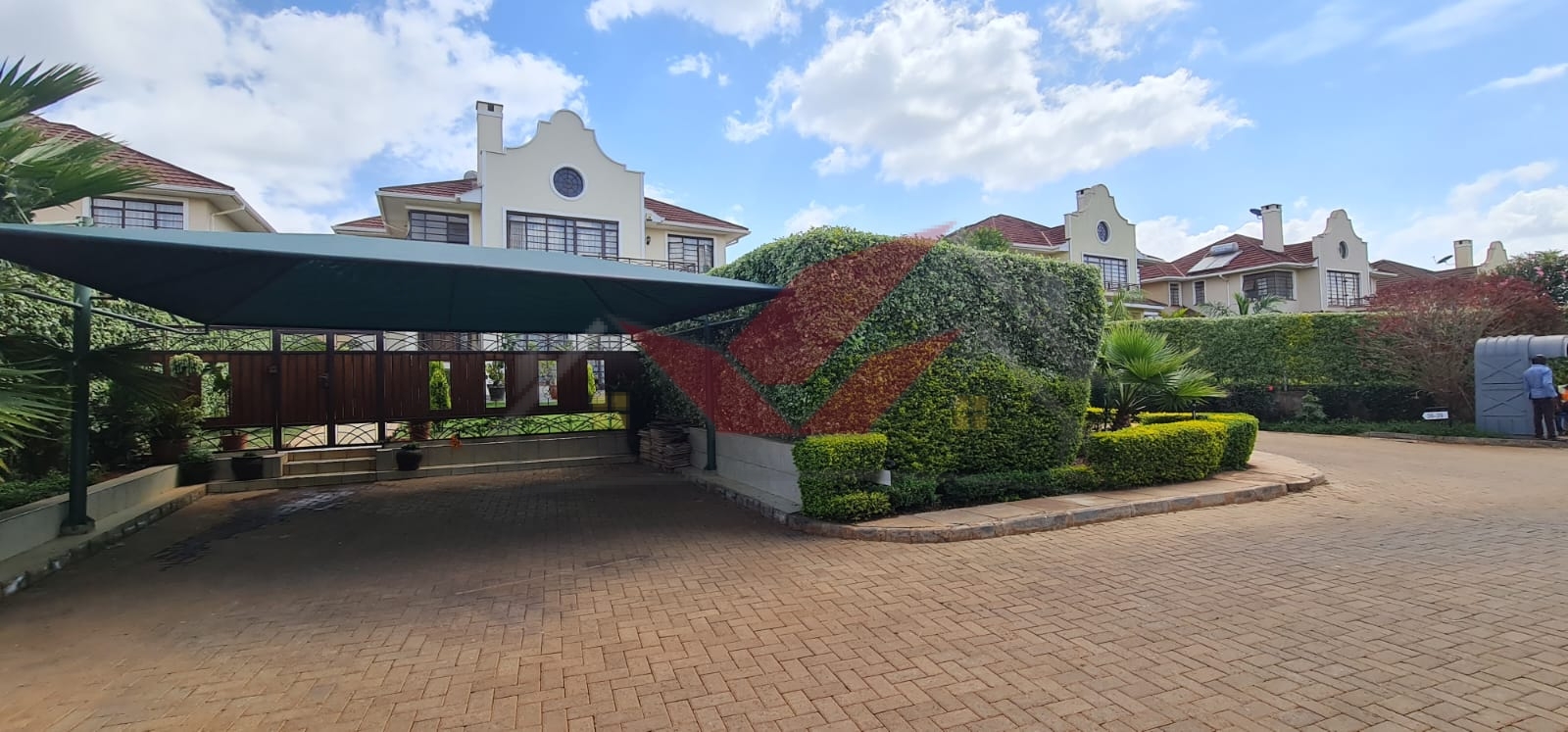 ### Luxurious 4-Bedroom Townhouse for Rent at Kencom Sacco Villas, Runda – USD 2,000/month (Furnished) or KSh 215,000/month (Unfurnished) **Location**: Kencom Sacco Villas, Runda (Adjacent to Paradise Lost on Kiambu Road) **Rent**: - **Furnished**: USD 2,000 per month (inclusive of service charge) - **Unfurnished**: KSh 215,000 per month (inclusive of service charge) Welcome to **Kencom Sacco Villas**, a tranquil oasis in the prestigious **Runda** neighborhood. This elegant **4-bedroom townhouse** offers a luxurious living experience, perfect for those seeking comfort, convenience, and a serene environment. Located next to **Paradise Lost** on **Kiambu Road**, this property is surrounded by lush greenery and scenic landscapes, offering the ideal setting for families and professionals. ### Property Highlights: - **Spacious Living & Dining Area**: Perfect for family gatherings and entertainment. - **Modern Kitchen**: Equipped with sleek cabinetry, granite countertops, and a large pantry. - **Guest Cloakroom**: Stylish and convenient for visitors. - **Ensuite Guest Bedroom**: Includes walk-in wardrobes, shower, and sink basin for added comfort. ### First Floor: - **Two Sharing Bedrooms**: Both rooms feature walk-in wardrobes and a shared bathroom with a shower and sink basin. - **Master Ensuite Bedroom**: Designed with spacious walk-in closets, a shower cubicle, sink basin, and dressing mirror for ultimate luxury. ### Exclusive Amenities: - **Manicured Lawn**: A beautiful outdoor space for relaxation and play. - **Staff Quarters (DSQ)**: Private accommodation for domestic staff. - **Cabro-Paved Parking**: Secure parking space for multiple vehicles. - **Borehole Water Supply**: Reliable water supply all year round. - **Swimming Pool & Gym**: Enjoy premium fitness and recreational facilities. - **Clubhouse**: Ideal for social gatherings and community events. - **On-Site Kindergarten**: Convenient educational facilities for young children. - **WiFi & Internet Connections**: Stay connected with high-speed internet access. - **CCTV Cameras & 24-Hour Security**: Ensuring your peace of mind with enhanced surveillance and manned gates. - **Man-Made Dam**: A unique and picturesque feature within the community. - **Solar Heaters & Efficient Sewerage**: Eco-friendly and sustainable living. - **Two Access Main Gates**: Double-gated entry for enhanced security. This luxurious townhouse combines modern living with serene surroundings, making it the perfect choice for those seeking a secure, upscale lifestyle in **Runda**. **For more information or to schedule a viewing**, [WhatsApp us here](https://wa.me/254732675057). --- ### Hashtags: #LuxuryLiving #TownhouseForRent #KencomSaccoVillas #RundaLiving #GatedCommunity #ParadiseLostNairobi #GreenLiving #SecureLiving #ModernAmenities #RealEstateKenya #FamilyHome #ExpatLiving #AffordableLuxury