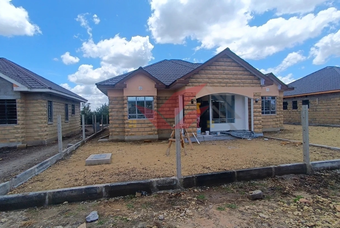 Spectacular All-Ensuite 3-Bedroom Bungalow for Sale in Kitengela Acacia -- Prime Location, Just 450m from Tarmac Location: Acacia, Kitengela Price: Kes 7 Million Contact: (+254) 732675057 [WhatsApp](https://wa.me/254732675057) ### Affordable and Convenient Bungalow in Kitengela's Premier Gated Community This stunning 3-bedroom all-ensuite bungalow, located in the highly sought-after Acacia area of Kitengela, offers both comfort and strong investment potential. Only 450 meters from the tarmac, this prime property is perfect for families, expatriates, and investors alike, with an estimated rental yield of Kes 45,000 per month. ### Property Features: - Prime Location: Just 450 meters from the main road, offering easy access without compromising on peace and privacy. - Modern All-Ensuite Design: Every bedroom is ensuite, providing comfort and privacy for all residents. - Spacious Layout: Includes a large sitting lounge, dining area, and an open-plan kitchen ideal for entertaining. - Functional Additions: Pantry and dedicated laundry area, adding practicality to daily living. - Gated Community Living: Secure gated estate with 12 units, ensuring a close-knit and secure environment. - Full Utilities: Enjoy uninterrupted 24/7 water and electricity supply. - Freehold Title Deed: Each bungalow comes with its own freehold title, giving you complete ownership and long-term security. - Plot Size: Each unit sits on a generous 50x100 plot, providing ample outdoor space. ### Flexible Payment Plans: - Cash Purchase: Full payment option - Installments: Book now and pay the balance within 3 months - Mortgage: Easy mortgage options available to suit your needs ### Why Buy in Kitengela, Acacia? Acacia in Kitengela is a thriving residential area, well-regarded for its serene atmosphere, proximity to Nairobi, and rising property values. With schools, hospitals, and shopping centers close by, Kitengela is a prime choice for both local and diaspora buyers seeking high-quality, affordable housing. ### Book Your Private Tour Today Don't miss this opportunity to own a modern bungalow in a growing neighborhood. Call us today for more information or to schedule your viewing. ️ Call or WhatsApp: (+254) 732675057 OR Https://wa.me/254732675057 #KitengelaBungalow #BungalowForSaleKenya #RealEstateInvestment #AffordableHousingKenya #PrimePropertyKitengela #KenyaRealEstate #GatedCommunityLiving #OwnYourHomeKenya #AllEnsuiteHomes #KitengelaRealEstate #AcaciaHomes #NewHomeKenya #ModernLivingKitengela #InvestInKitengela #KenyaDiasporaInvestments #SecureCommunity #FamilyHomesKenya #KenyaPropertyDeals #PrimeHomesKenya #KitengelaProperties #DiasporaPropertyKenya #GatedCommunityKenya #KenyaRealEstateMarket