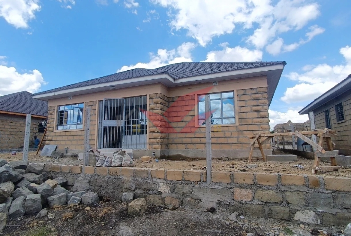 Spectacular All-Ensuite 3-Bedroom Bungalow for Sale in Kitengela Acacia -- Prime Location, Just 450m from Tarmac Location: Acacia, Kitengela Price: Kes 7 Million Contact: (+254) 732675057 [WhatsApp](https://wa.me/254732675057) ### Affordable and Convenient Bungalow in Kitengela's Premier Gated Community This stunning 3-bedroom all-ensuite bungalow, located in the highly sought-after Acacia area of Kitengela, offers both comfort and strong investment potential. Only 450 meters from the tarmac, this prime property is perfect for families, expatriates, and investors alike, with an estimated rental yield of Kes 45,000 per month. ### Property Features: - Prime Location: Just 450 meters from the main road, offering easy access without compromising on peace and privacy. - Modern All-Ensuite Design: Every bedroom is ensuite, providing comfort and privacy for all residents. - Spacious Layout: Includes a large sitting lounge, dining area, and an open-plan kitchen ideal for entertaining. - Functional Additions: Pantry and dedicated laundry area, adding practicality to daily living. - Gated Community Living: Secure gated estate with 12 units, ensuring a close-knit and secure environment. - Full Utilities: Enjoy uninterrupted 24/7 water and electricity supply. - Freehold Title Deed: Each bungalow comes with its own freehold title, giving you complete ownership and long-term security. - Plot Size: Each unit sits on a generous 50x100 plot, providing ample outdoor space. ### Flexible Payment Plans: - Cash Purchase: Full payment option - Installments: Book now and pay the balance within 3 months - Mortgage: Easy mortgage options available to suit your needs ### Why Buy in Kitengela, Acacia? Acacia in Kitengela is a thriving residential area, well-regarded for its serene atmosphere, proximity to Nairobi, and rising property values. With schools, hospitals, and shopping centers close by, Kitengela is a prime choice for both local and diaspora buyers seeking high-quality, affordable housing. ### Book Your Private Tour Today Don't miss this opportunity to own a modern bungalow in a growing neighborhood. Call us today for more information or to schedule your viewing. ️ Call or WhatsApp: (+254) 732675057 OR Https://wa.me/254732675057 #KitengelaBungalow #BungalowForSaleKenya #RealEstateInvestment #AffordableHousingKenya #PrimePropertyKitengela #KenyaRealEstate #GatedCommunityLiving #OwnYourHomeKenya #AllEnsuiteHomes #KitengelaRealEstate #AcaciaHomes #NewHomeKenya #ModernLivingKitengela #InvestInKitengela #KenyaDiasporaInvestments #SecureCommunity #FamilyHomesKenya #KenyaPropertyDeals #PrimeHomesKenya #KitengelaProperties #DiasporaPropertyKenya #GatedCommunityKenya #KenyaRealEstateMarket