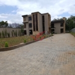 Modern 5-Bedroom Townhouse for Sale -- Hardy, Karen (Mukoma Road) Price: Ksh 125,000,000 Prime Half-Acre Property Gated Community of 3 Units Private Driveway Access Option Experience luxury, space, and sophistication in this brand-new 5-bedroom all-ensuite townhouse located in the prestigious Hardy, Karen area along Mukoma Road. Set within an exclusive gated community of just three homes, this property redefines modern family living with its elegant design, spacious interiors, and serene natural surroundings. ### Prime Location -- Hardy, Karen This property is perfectly positioned in the highly sought-after Hardy neighborhood of Karen---an area known for its tranquility, greenery, and elite lifestyle. It offers seamless access to top amenities including The Hub Karen, Galleria Mall, Karen Hospital, Brookhouse School, Hillcrest International School, Banda School, and a wide range of fine dining and entertainment venues. Enjoy the perfect balance between peaceful suburban living and easy city access. ### Property Features * 5 spacious ensuite bedrooms with premium finishes * 3 lounges, including a family/TV room and an upstairs relaxation area * Elegant living room and dining area designed for entertaining * 2 fully fitted modern kitchens * Study/office room ideal for remote work * Gym area / wellness space * Beautiful manicured garden for outdoor leisure * Ample parking space for several cars * Own private driveway for enhanced privacy ### Gated Community & Security Set in a secure compound of only 3 homes, this property ensures exclusive privacy, peace, and safety. It features electric fencing, 24/7 security guards, CCTV surveillance readiness, and a controlled access gate, offering residents total peace of mind. ### Why Invest in This Karen Property This luxurious 5-bedroom townhouse is more than just a home---it's a statement of success and comfort. Ideal for families, expatriates, or diaspora investors seeking premium property in Nairobi's upscale suburbs. With its modern design, half-acre space, and strategic location, it's one of the finest homes for sale in Hardy, Karen today. Contact us today to schedule a private viewing: Call / WhatsApp: 0732 675 057 #KarenHomes #LuxuryLiving #HardyKaren #MukomaRoad #KarenRealEstate #NairobiHomes #LuxuryHomesKenya #KarenLifestyle #DiasporaInvestments #RealEstateKenya #KarenPropertyForSale #DreamHomeKenya #LuxuryTownhouse #KarenLuxuryHomes #InvestInKenya #NairobiLuxuryLiving