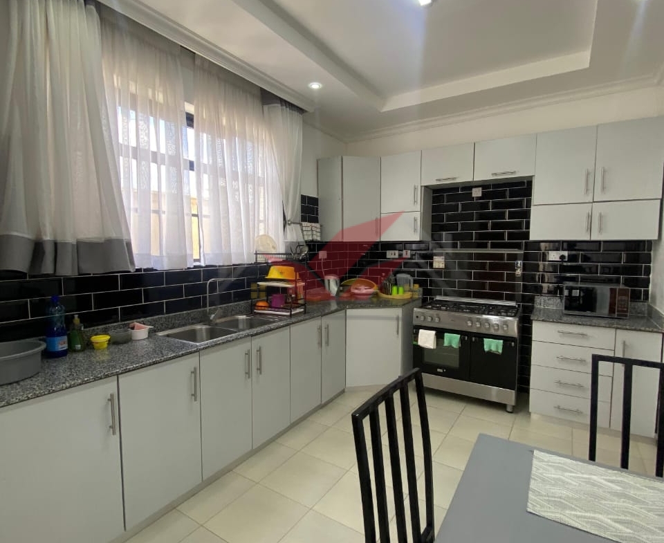 ## 🌄 Modern 4-Bedroom All-En-suite Bungalow With Attic for Sale in Ngong Kibiko | 1/8 Acre | KES 14M | Secure & Contemporary Living ### A Rare Opportunity to Own a Modern, Stylish Home in the Rapidly Growing Ngong Kibiko Area Discover exceptional value, comfort, and modern living with this beautiful 4-bedroom all-en-suite bungalow for sale in Ngong Kibiko, sitting on a 1/8-acre plot in one of the most desirable and fast-developing residential zones in Ngong. Designed with elegance and functionality in mind, this property is perfect for families, investors, and diaspora buyers seeking a ready-to-move-in modern home in a peaceful, scenic, and highly accessible environment. This spacious home combines contemporary architecture with practical indoor–outdoor living, offering the perfect balance of style, security, and convenience. With an attic, landscaped yard, and premium finishes throughout, the property offers a lifestyle of comfort and long-term value. ### 🏡 Property Features * 4 All-En-suite Bedrooms – Ensuring privacy and comfort for every family member * Spacious Lounge + Separate Dining Area – Perfect for hosting and everyday living * Modern Kitchen with Pantry – Sleek design, ample storage, and high functionality * Master Bedroom with Mini Walk-In Closet – Designed for convenience and luxury * Attic Space – Ideal for home office, family room, or additional storage * Solar System Installed – Energy efficient and cost-saving * Front Yard Garden – Beautiful outdoor ambiance for relaxation * CCTV Surveillance – Enhanced home security * Dedicated Laundry/Wash Area * Water Tower – Ensures constant water supply * Sliding Gate – Modern, secure, and easy to operate ### 🌍 Why Invest in Ngong Kibiko? Ngong Kibiko is one of the most sought-after investment and residential areas, offering: * High altitude views and serene environment * Rapid infrastructure growth and rising property values * Proximity to Ngong Town, the SGR Station, schools, hospitals & shopping centers * Reliable transport links to Karen, Nairobi CBD, and surrounding areas * Clean air, scenic landscapes, and a safe community environment With property values steadily rising, this home offers both lifestyle excellence and strong investment potential. ### 📞 Book a Viewing or Get More Details Call/WhatsApp: 0732675057 Direct link: [https://wa.me/254732675057](https://wa.me/254732675057) Ngong houses for sale, Ngong Kibiko property, 4-bedroom bungalow Ngong, modern homes for sale Kenya, diaspora investments Kenya, affordable modern homes Nairobi, buy house in Ngong, Ngong real estate. #Ngong #Kibiko #NgongHomes #ModernBungalow #HomesForSaleKenya #KenyaRealEstate #DiasporaInvestments #NgongLiving #AffordableHomesKenya #PropertyKenya #NairobiRealEstate #InvestInKenya