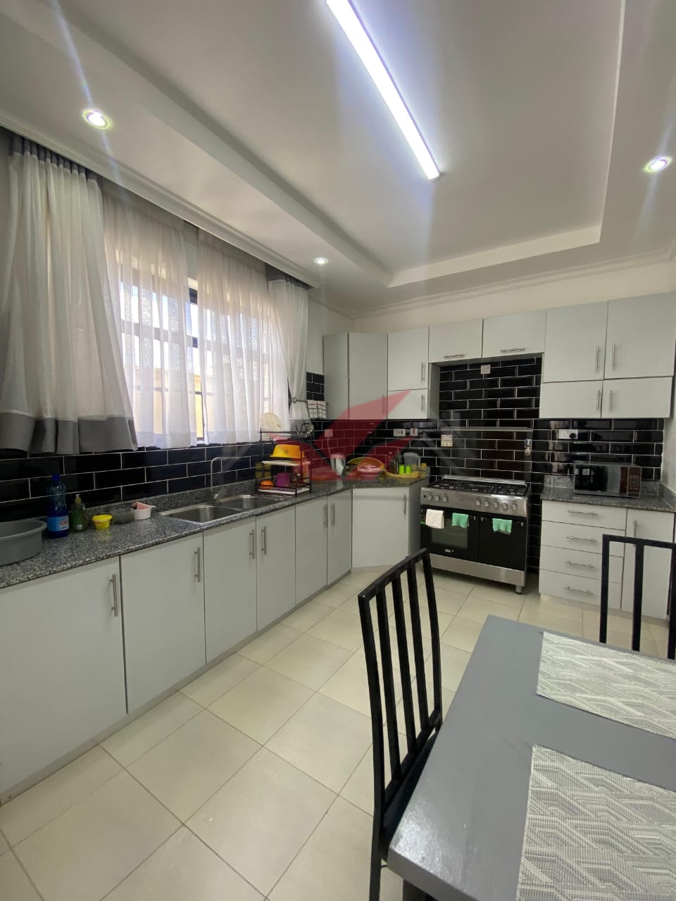 ## 🌄 Modern 4-Bedroom All-En-suite Bungalow With Attic for Sale in Ngong Kibiko | 1/8 Acre | KES 14M | Secure & Contemporary Living ### A Rare Opportunity to Own a Modern, Stylish Home in the Rapidly Growing Ngong Kibiko Area Discover exceptional value, comfort, and modern living with this beautiful 4-bedroom all-en-suite bungalow for sale in Ngong Kibiko, sitting on a 1/8-acre plot in one of the most desirable and fast-developing residential zones in Ngong. Designed with elegance and functionality in mind, this property is perfect for families, investors, and diaspora buyers seeking a ready-to-move-in modern home in a peaceful, scenic, and highly accessible environment. This spacious home combines contemporary architecture with practical indoor–outdoor living, offering the perfect balance of style, security, and convenience. With an attic, landscaped yard, and premium finishes throughout, the property offers a lifestyle of comfort and long-term value. ### 🏡 Property Features * 4 All-En-suite Bedrooms – Ensuring privacy and comfort for every family member * Spacious Lounge + Separate Dining Area – Perfect for hosting and everyday living * Modern Kitchen with Pantry – Sleek design, ample storage, and high functionality * Master Bedroom with Mini Walk-In Closet – Designed for convenience and luxury * Attic Space – Ideal for home office, family room, or additional storage * Solar System Installed – Energy efficient and cost-saving * Front Yard Garden – Beautiful outdoor ambiance for relaxation * CCTV Surveillance – Enhanced home security * Dedicated Laundry/Wash Area * Water Tower – Ensures constant water supply * Sliding Gate – Modern, secure, and easy to operate ### 🌍 Why Invest in Ngong Kibiko? Ngong Kibiko is one of the most sought-after investment and residential areas, offering: * High altitude views and serene environment * Rapid infrastructure growth and rising property values * Proximity to Ngong Town, the SGR Station, schools, hospitals & shopping centers * Reliable transport links to Karen, Nairobi CBD, and surrounding areas * Clean air, scenic landscapes, and a safe community environment With property values steadily rising, this home offers both lifestyle excellence and strong investment potential. ### 📞 Book a Viewing or Get More Details Call/WhatsApp: 0732675057 Direct link: [https://wa.me/254732675057](https://wa.me/254732675057) Ngong houses for sale, Ngong Kibiko property, 4-bedroom bungalow Ngong, modern homes for sale Kenya, diaspora investments Kenya, affordable modern homes Nairobi, buy house in Ngong, Ngong real estate. #Ngong #Kibiko #NgongHomes #ModernBungalow #HomesForSaleKenya #KenyaRealEstate #DiasporaInvestments #NgongLiving #AffordableHomesKenya #PropertyKenya #NairobiRealEstate #InvestInKenya