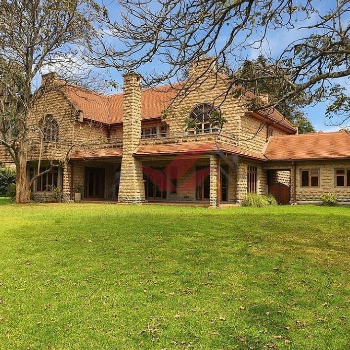 Exterior view of a modern 5-bedroom all-ensuite luxury house with DSQ for sale in Windyridge Karen, located within a secure gated community. Price 105M Negotiable