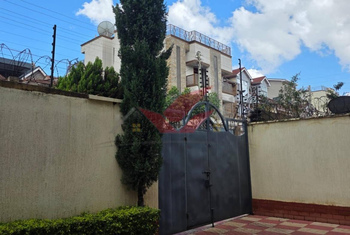 Private manicured garden and outdoor living space of an executive 6 bedroom house in Langata.