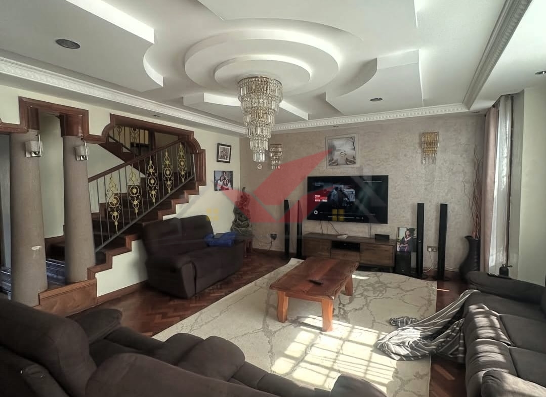 Spacious light-filled lounge and dining area in a luxury Langata family home.