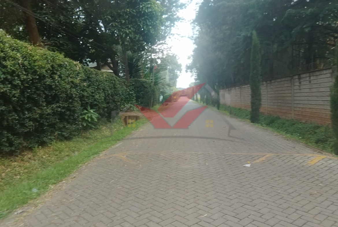 Prime 1-acre residential land for sale along Ndege Road, Karen. Features majestic mature trees and excellent proximity to Karen Hospital. Perfect for a luxury villa.